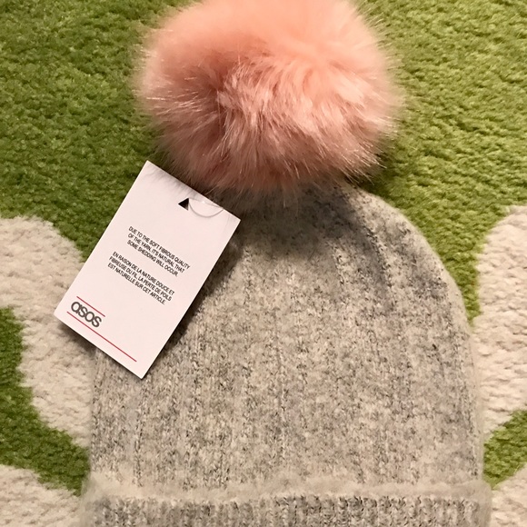 grey hat pink pom pom